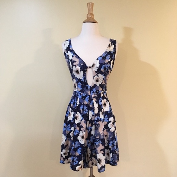 Flirty Cutout Front Deep V Back Floral Romper - Picture 4 of 6